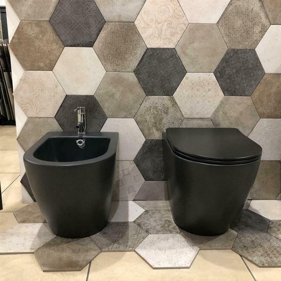 Zenit sanitary ware in matt black ceramic, back to wall bidet and toilet and slow closing toilet seat
